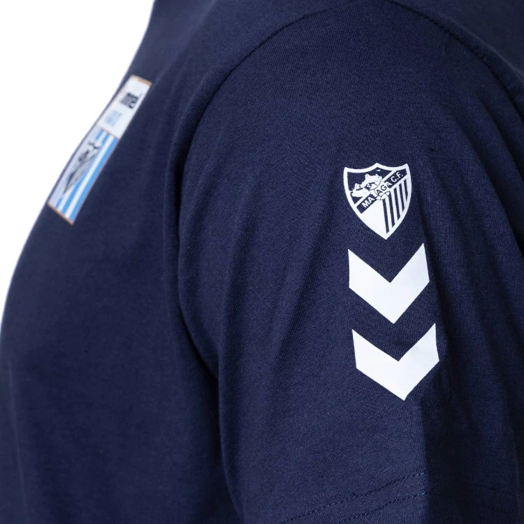 Camiseta Hummel Málaga CF Fanswear 2022-2023 Niño 6 Camiseta Hummel Málaga CF Fanswear 2022-2023 Niño - Imagen 4